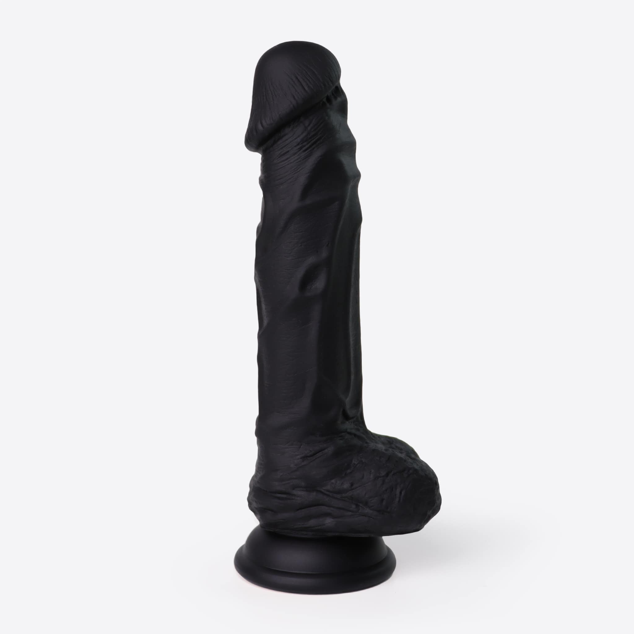Ohasis realistisk sort dildo stående set fra siden